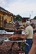 Jim Campbell Hands a Piece of the Big Burger to Larry the Cable Guy